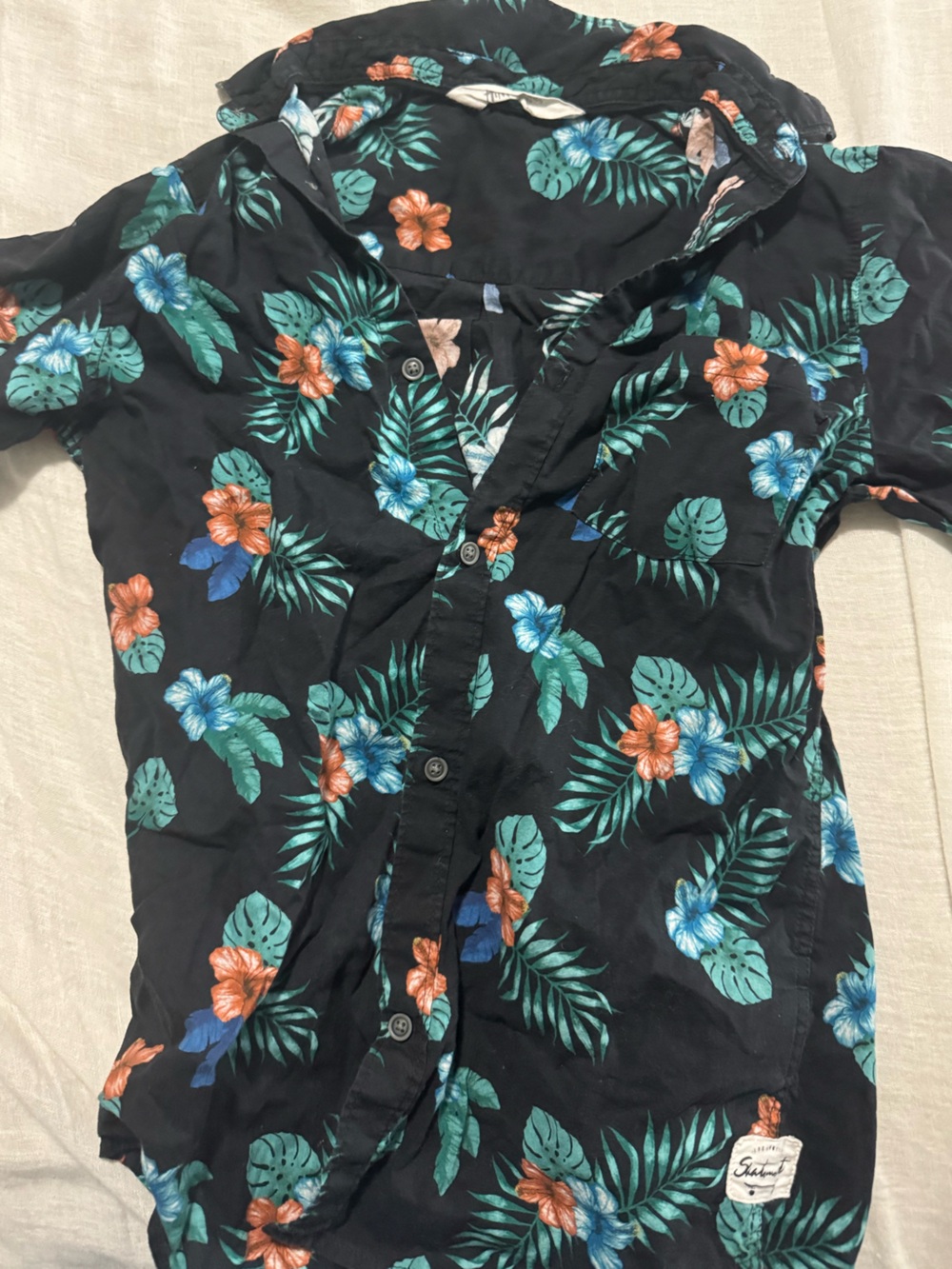 H&M Black Shirt with Teal & Light Blue Tropical Leaves